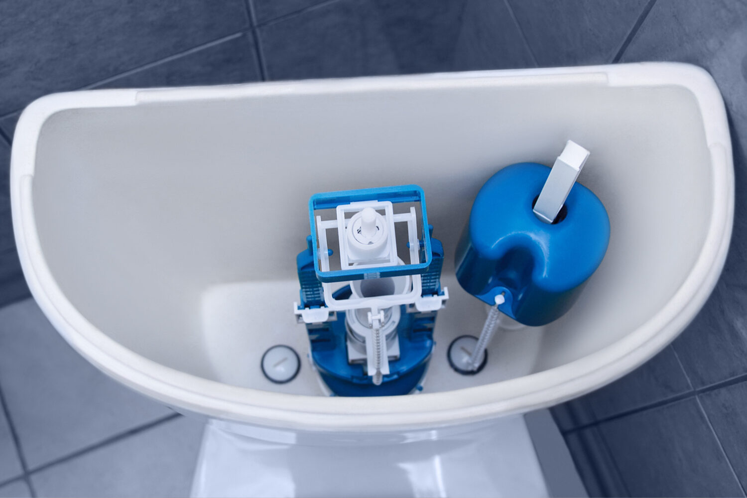 Old broken fittings in a dirty toilet and a new clean one. Plumbing repair. Before and after.